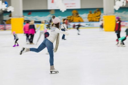 "Skaters enjoying the indoor Dubai Ice Rink at The Dubai Mall"