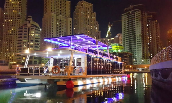 "Luxurious Marina dinner cruise under the starlit Dubai sky"